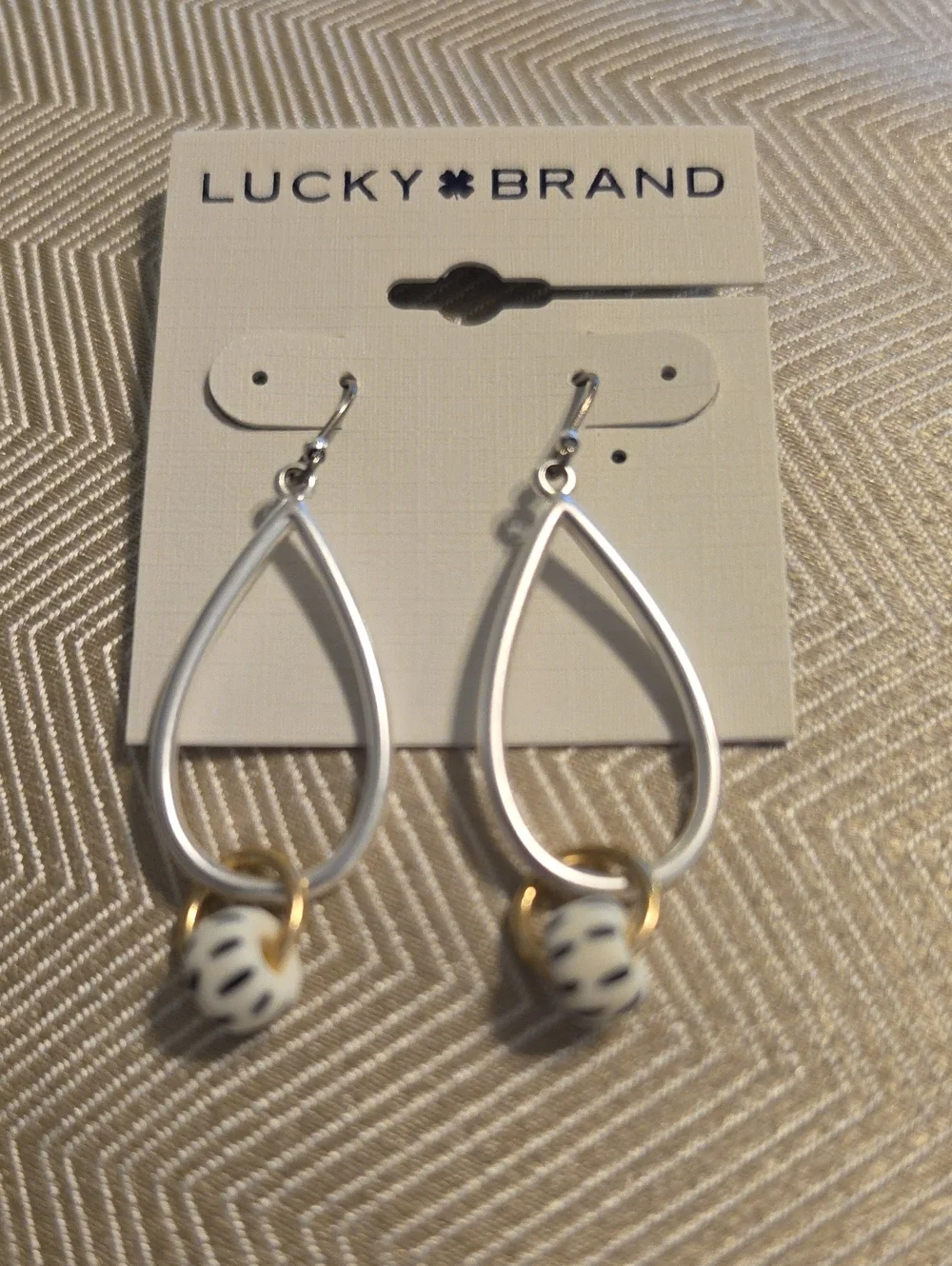 Lucky Brand White and Gold Open Teardrop Earrings with Bead